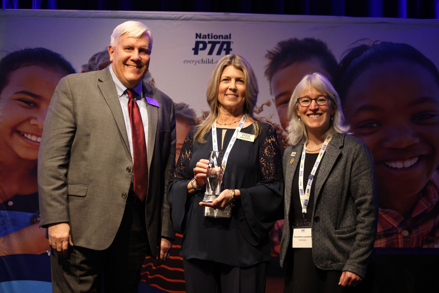 WSPTA President Angela Steck and WSPTA advocate Gwen Loosmore accept the award Outstanding State PTA Advoacy Award.